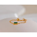 Gold Chain Ring with Emerald