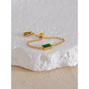 Gold Chain Ring with Emerald