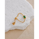 Gold Chain Ring with Emerald