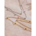 Layered Gold Heart Necklace with Crystal Accent