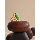 Ban Gold Frame Ring with Emerald-Green Stone
