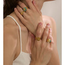 Gold Sculptural Ring with Turquoise Stone Center