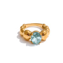 Gold Beaded Ring with Sky Blue Stone