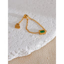 Gold Chain Ring with Emerald